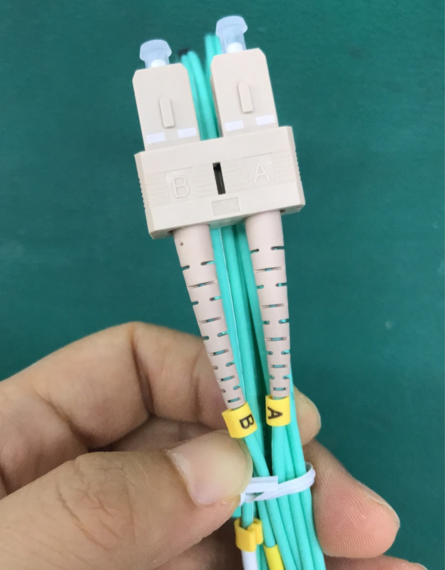 SC LC Fiber Optik Yama Kablosu OM3 300 Dubleks LSZH Ceket Aqua Renkli